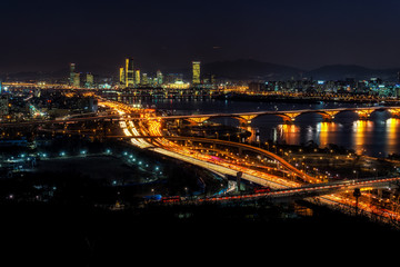 Fototapeta na wymiar Night traffic over han river in seoul