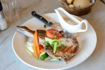 Pork chop steak and vegetable salad