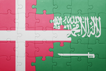 puzzle with the national flag of saudi arabia and denmark