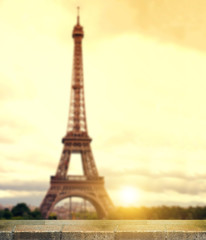 Blurred of eiffel tower in Paris at sunset. 