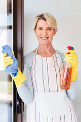 middle aged woman doing housework