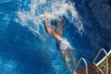 Boy in the swimming pool