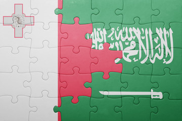 puzzle with the national flag of saudi arabia and malta