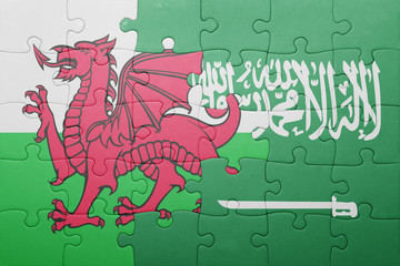 puzzle with the national flag of saudi arabia and wales