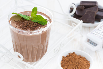 chocolate milkshake and ingredients, close-up