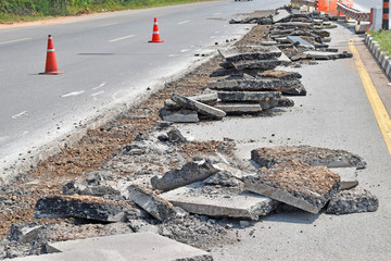 Repairing the asphalt pavement on the road.