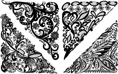 four triangular black decorations on white