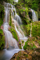 Beautiful view of a waterfall among cliffs in spring time, Krushuna waterfalls in Bulgaria