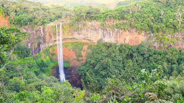 Waterfall in rainforest. Chamarel Falls is a scenic location and nature attraction on Mauritius Island. 
