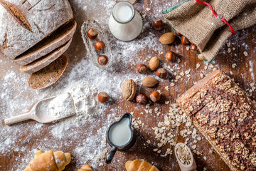 At the bakery, view from above, croissants, bread, milk, nuts and flour