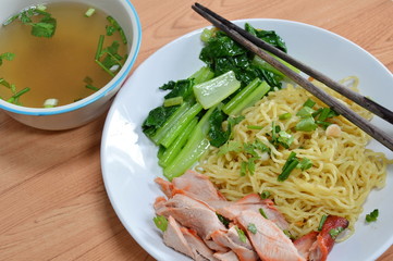 Chinese egg noodle with barbecue pork and soup
