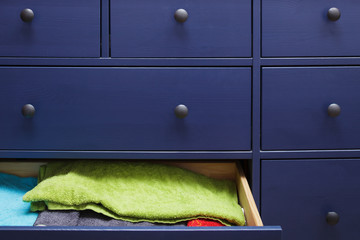 Blue dresser with towels