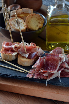 appetizer of ham Serrano with bread roasted