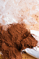 cocoa powder on wooden background