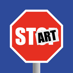 Road traffic STOP sign with a sticker of the word ART added to change it to START