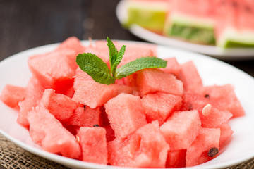 watermelon slices cut on the plate with mint