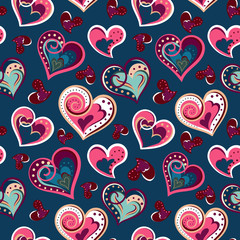 Naklejka premium Hand drawn doodle seamless pattern of hearts. Colofrul hearts on colored background. Vector illustration
