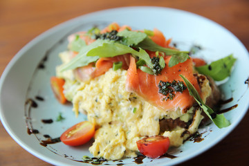 Scrambled eggs with smoked salmon and avocado