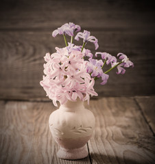 spring flowers on wooden background