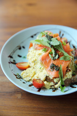 Scrambled eggs with smoked salmon and avocado