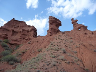Fototapeta na wymiar red rock formations in Canyon Konorchek in Kyrgyzstan
