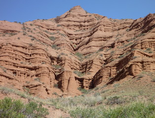 Fototapeta premium red rock formations in Canyon Konorchek in Kyrgyzstan