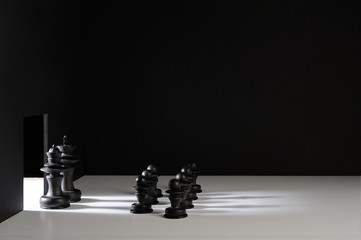 black chess pieces meeting