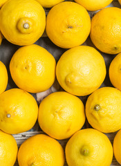 Colorful Display Of Lemons In Market
