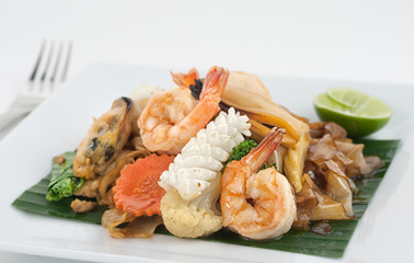 Fried seafood mix isolated on white