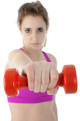 Frau beim Kraftsport beim Training mit Hanteln und Gewichten 