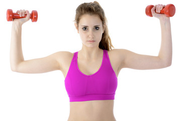Frau bei Fitness und Workout beim Training mit Hanteln und Gewichten 