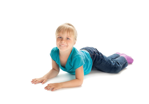 Little girl lying on the floor