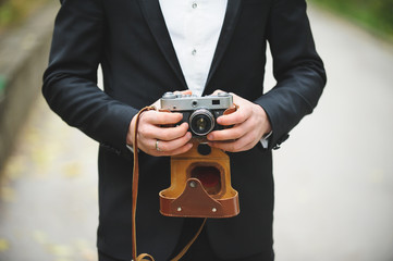 Groom with Old Camera