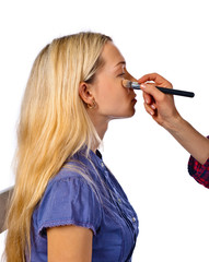 Obraz premium Makeup artist apply makeup to a model