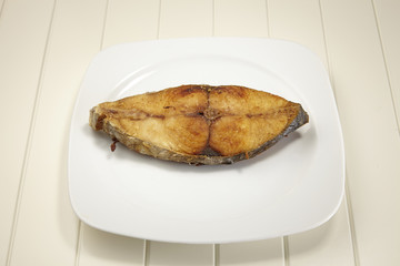 deep fried seer fish on a plate