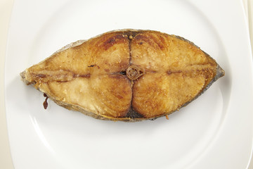 deep fried seer fish on a plate