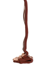 Chocolate flow isolated on white background close up