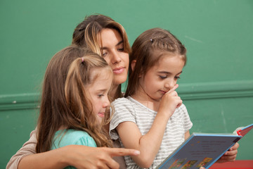 kindergarten class reading a book