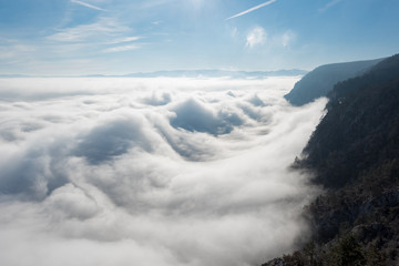 über den Wolken - Aerial view of the sky and fog a from a plateau on a mountain.