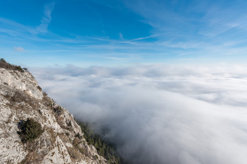 über den Wolken - Aerial view of the sky and fog a from a plateau on a mountain.