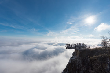 View of an Skywalk high above a smokescreen in front of blue sky in Lower Austria