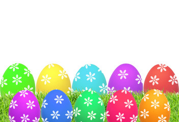 Fototapeta premium Easter eggs on green grass isolated on white