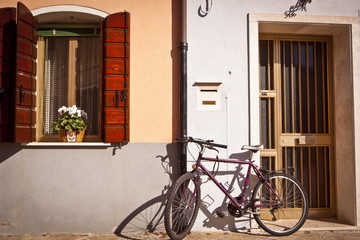 Fototapeta na wymiar Bicycle In Burano Islands, Italy