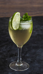 Mojito cocktail on dark table