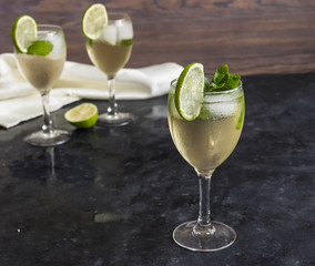 Mojito cocktail on dark table