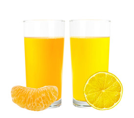 lemon and orange juice in the glass isolated on white