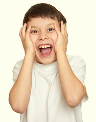 grimacing face boy portrait, teenager closeup