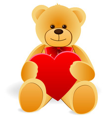 Toy Teddy Bear with heart. Isolated on white background