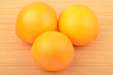Orange on wooden background