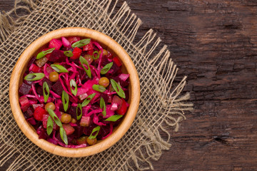 Top view of  beetroot salad Russian Vinaigrette or Vinegret in a